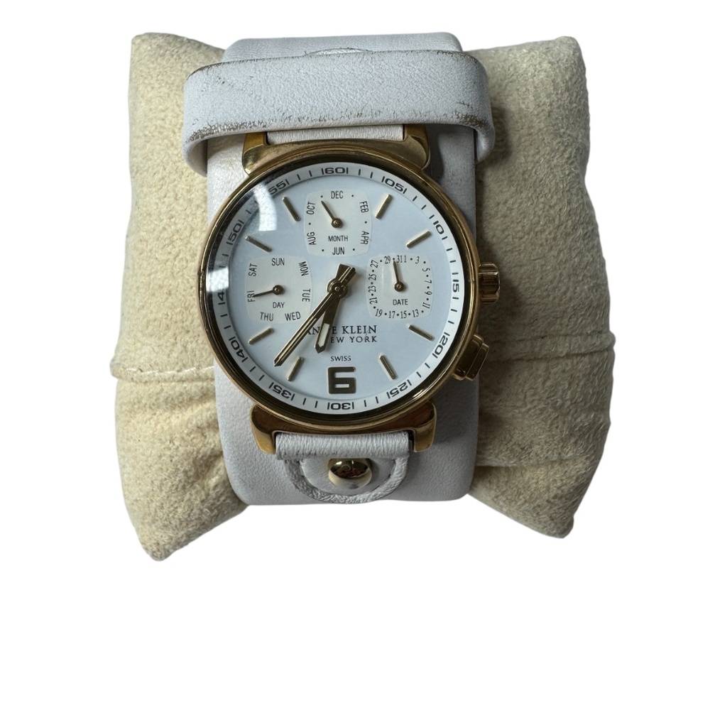 Women's Anne Klein gold-tone multifunction watch with white dial & leather cuff